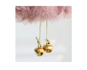 Detail of pink plush angel doll with tulle mesh accents and golden bells hanging below