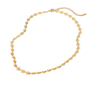 Detail of 18K gold stainless steel flower necklace with turquoise beads and lobster clasp