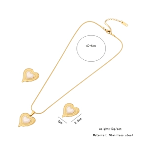 Detail view of heart pendant jewelry set with dimensions and stainless steel material
