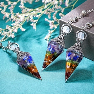 Set of three hexagonal pyramid resin necklaces with colorful stones and silver filigree