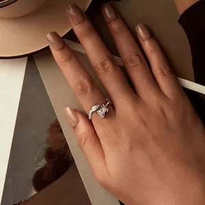 Vintage snake and rose open ring in S925 sterling silver worn on a finger
