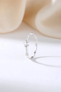 Detail of S925 sterling silver ring showing the star design and clear zircon stones