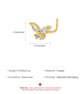 Detailansicht eines L-förmigen Schmetterlings-Nasensteckers aus Gold-Kupfer mit Zirkonia-Steinen
