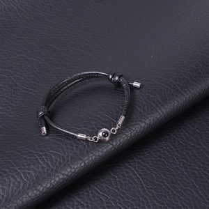 Black woven rope bracelet with 100 languages I Love You projection stone and silver bead