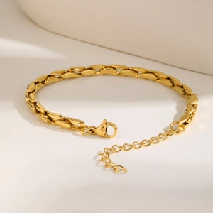 Elegant gold stainless steel curb link bracelet with lobster clasp and adjustable chain