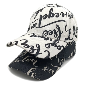 Black and white graffiti print baseball caps with street style lettering design