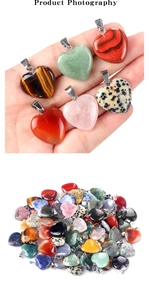 Detailed macro shot showing assorted 20mm heart-shaped natural crystal stone pendants