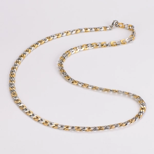 Detail of two-tone gold and silver Cuban link necklace with intricate woven texture