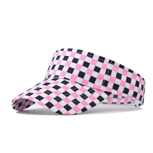 Detail of pink and black checkerboard pattern on a breathable sun visor hat fabric