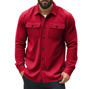 Close-up of red cotton jacket featuring chest flap pockets and black buttons