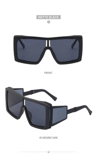 Front and 45 degree side view of matte black steampunk shield sunglasses with dark lenses