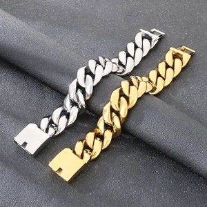 Polished 25mm wide stainless steel Cuban link bracelet in silver and gold tones