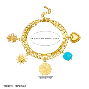 Double-layer stainless steel gold bracelet with sun, heart, and flower charms on white background