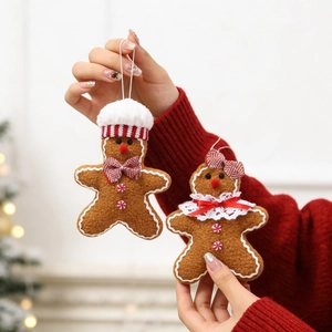 Plush gingerbread man couple ornaments for Christmas tree with chef hat and bow tie details