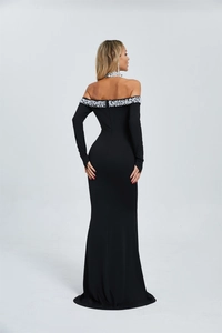 Detail of beaded halter neckline on black off-shoulder fishtail evening dress