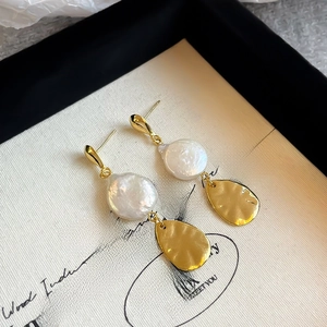 Elegant baroque pearl tassel earrings with hammered gold finish on black gift box
