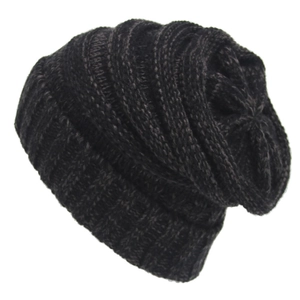Close-up of dark grey knitted beanie showing thick textured vertical ribbed pattern