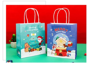 Detail showing two festive Christmas paper bags with Santa Claus and reindeer graphics