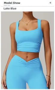 Detail of square neck yoga tank top and high waist leggings in lake blue matte fabric