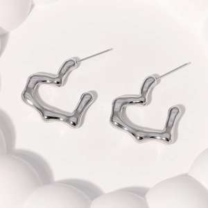 Minimalist heart-shaped stainless steel earrings with irregular silver lava design