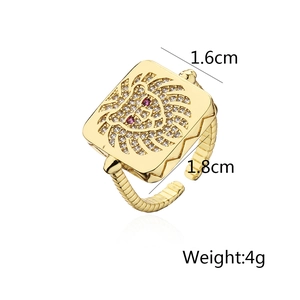 Detailed view of gold lion head ring showing 1.6cm width and 4g weight dimensions