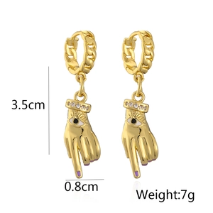 Detail showing gold plated evil eye hand earrings with dimensions 3.5cm by 0.8cm and 7g weight