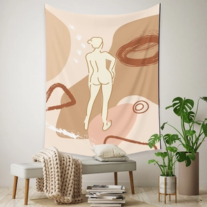 Detail of Bohemian abstract female line art tapestry hanging over a cozy lounge bench