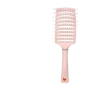 Professional pink vented hair brush with curved skeletal design for fast blow drying