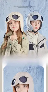 Detail of warm kids pilot hat with goggles and fleece lining for winter outdoors