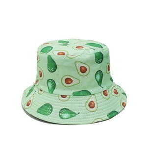 Detailed close-up of light green fisherman hat featuring avocado patterns and neat stitching