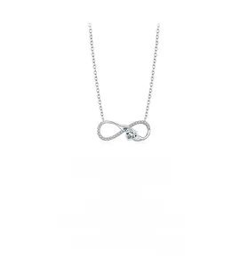 Macro detail of infinity heart pendant in 925 silver with sparkling crystal inlay