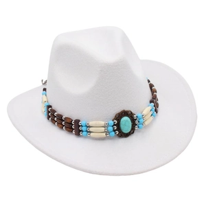 Close-up of bohemian turquoise beadwork and ethnic trim on a white wool felt cowboy hat