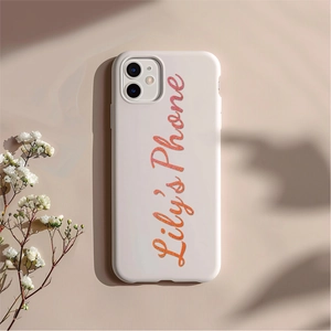 Close-up of matte white iPhone case with personalized orange pink glitter Lily's Phone text