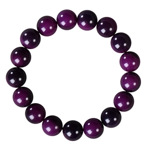 Deep purple Bodhi root bead bracelet with 15 smooth translucent spheres on white background