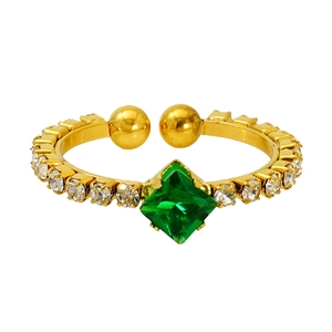 Detail of adjustable gold ring with emerald green stone and small pavé cubic zirconia