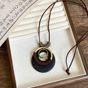 Bohemian retro wood bead pendant necklace with brown cord and brass circles detail