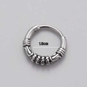 Detail shot of vintage silver skull hoop earring showing 1.0cm inner diameter size