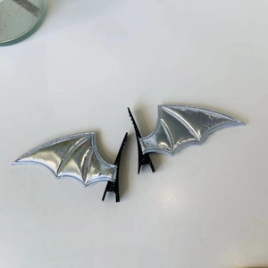 Silver bat wing hair clips with leather texture for Halloween and gothic parties