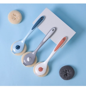Detailed view of long-handle kitchen brushes with ergonomic grip and fiber scrub balls