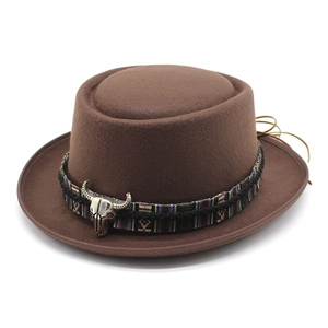 Brown wool felt western cowboy hat with bohemian woven band and metal bull head ornament