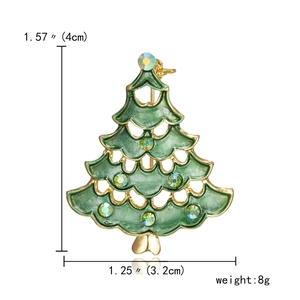 Detail view of a 4cm green enamel Christmas tree brooch with colorful rhinestones and size labels