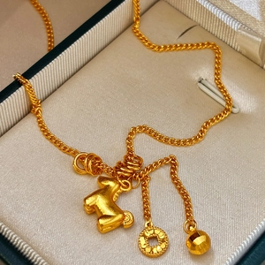 24K gold plated necklace featuring 3D pony and coin pendants in a jewelry gift box
