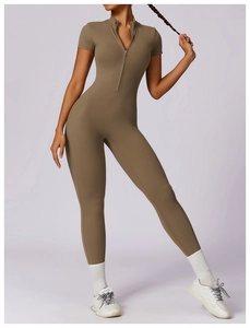 Detailed view of the front zipper design and premium stretch fabric on the yoga bodysuit