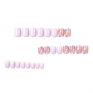 Short square lavender press-on nails with purple floral designs and gold glitter accents