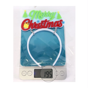 Weight measurement of 19.5g for Merry Christmas headband with green tree decor