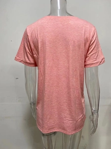 Detail shot of the back of a pink V-neck cotton blend T-shirt with subtle heather texture