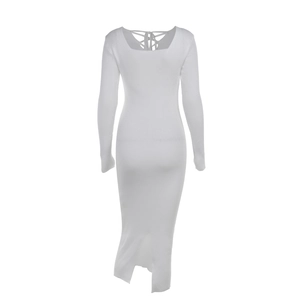 Detail of white knitted dress featuring a lace-up back design and sleek side slit hem