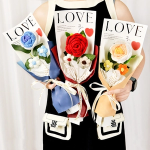 Handmade crochet rose bouquet with blue red and pink flowers in elegant packaging