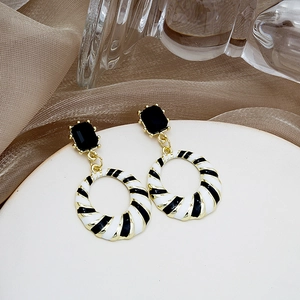 Vintage geometric black and white enamel drop earrings with spiral hoops for women