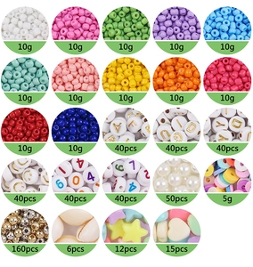 Detail view of 25 grid jewelry making kit featuring assorted glass seed and letter beads